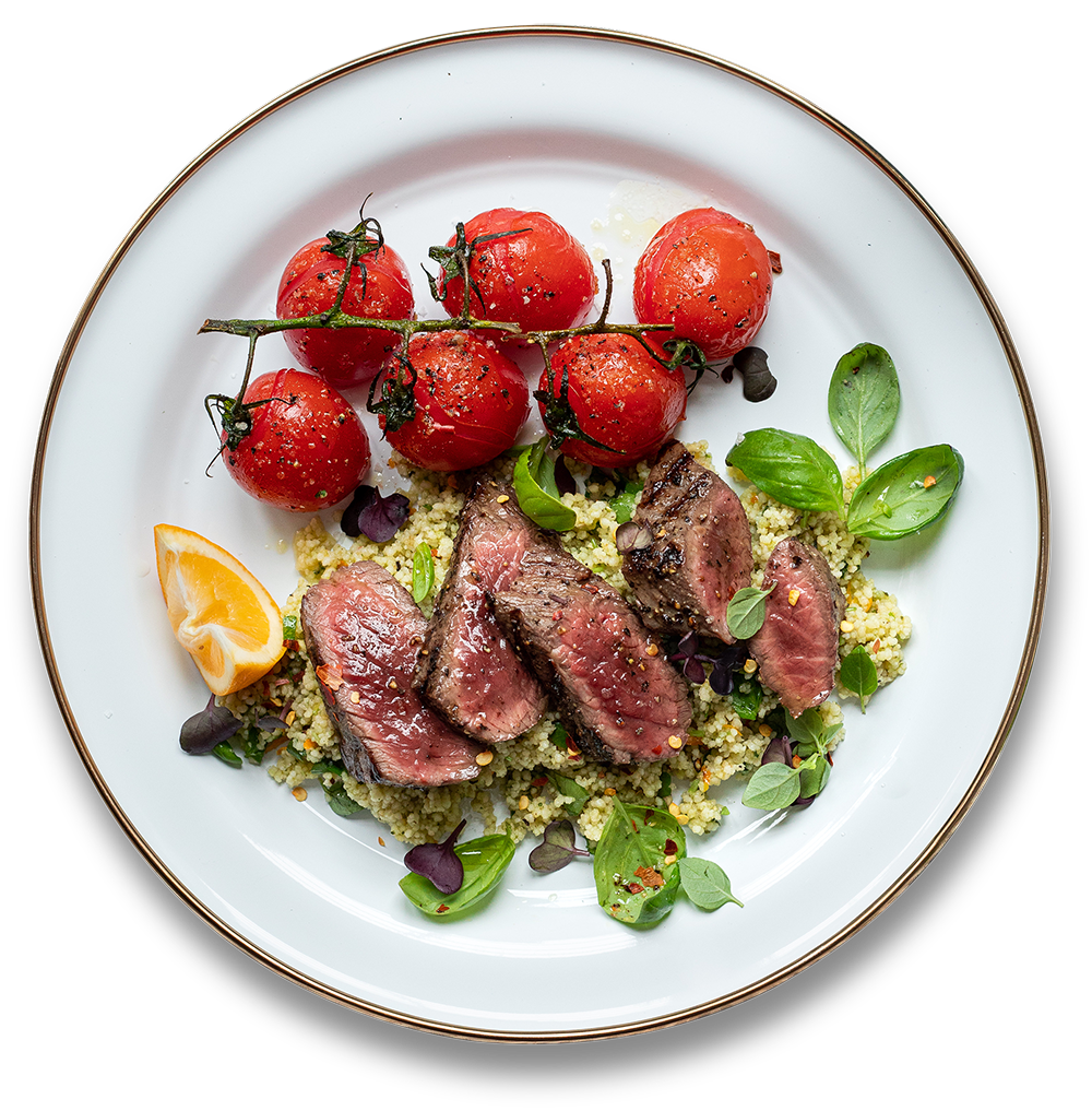 Seared venison fillet on cous cous salad with tomatoes
