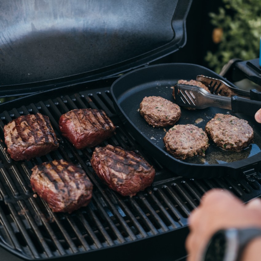 Venison fillets and patties on the BBQ